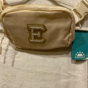 New crossbody bag
Letter E